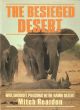 THE BESIEGED DESERT: WAR, DROUGHT, POACHING IN THE NAMIB DESERT. By Mitch Reardon.